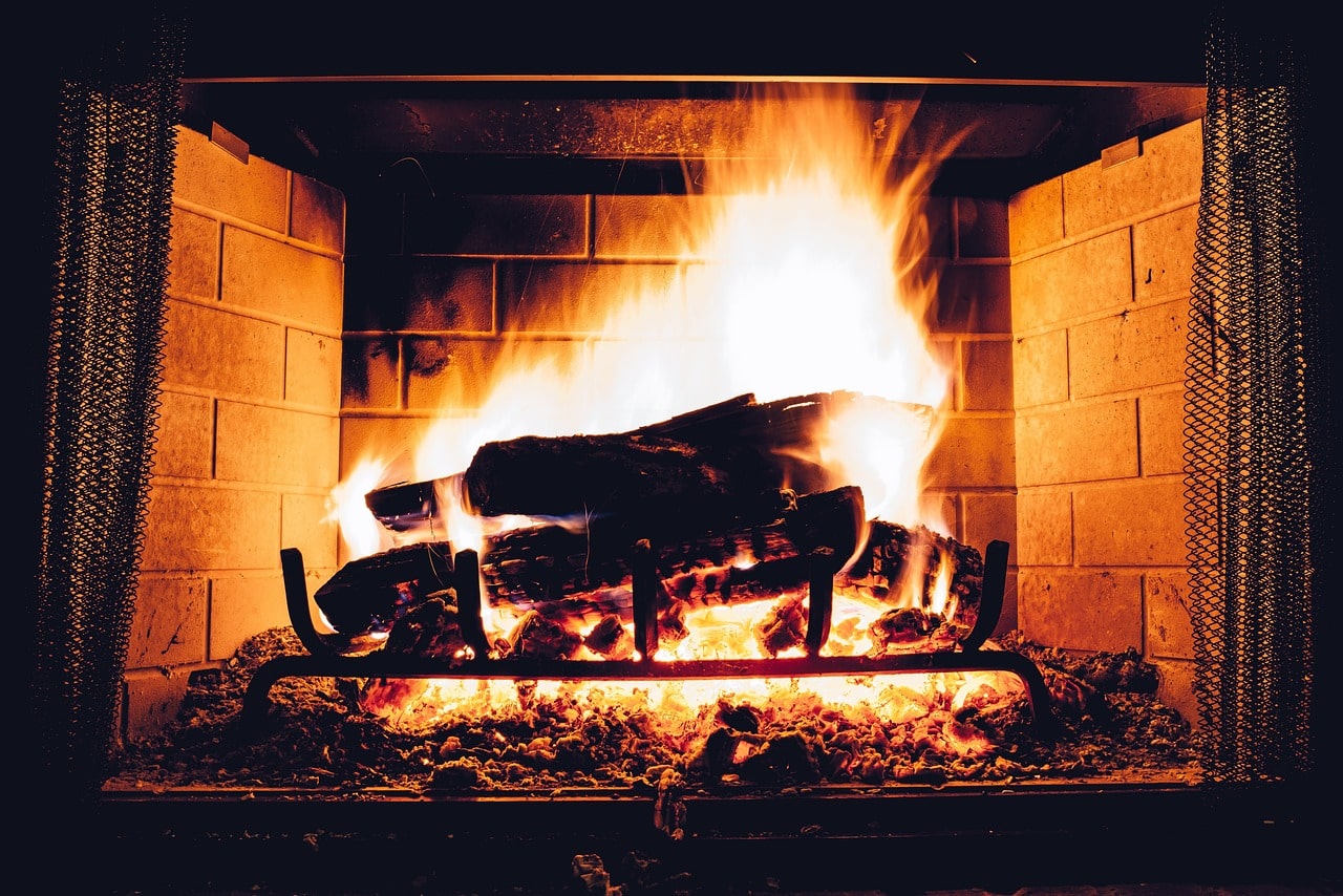 Logs in Essex | Roaring Fire in Fireplace